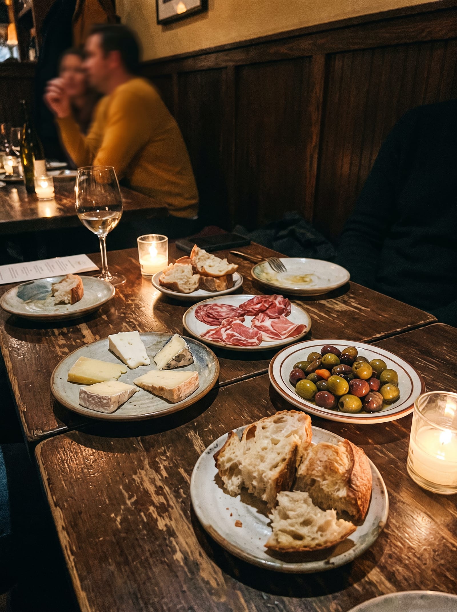 Small plates of cheese and charcuterie