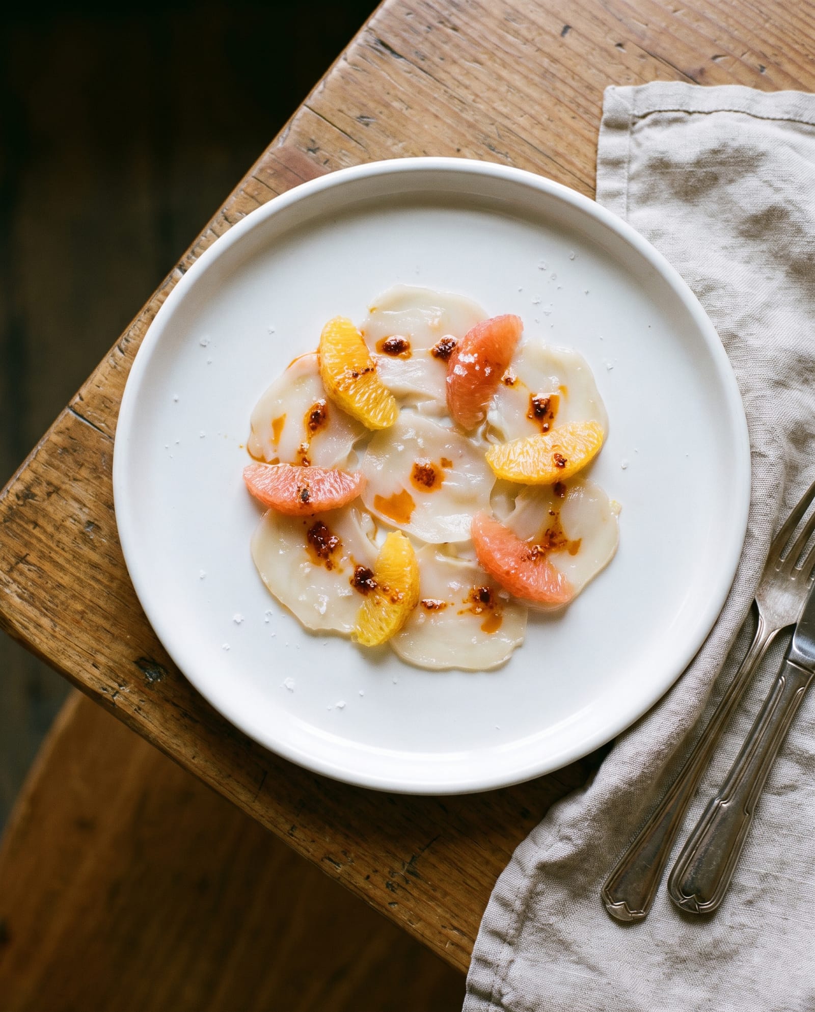 Geoduck crudo with citrus and chili oil